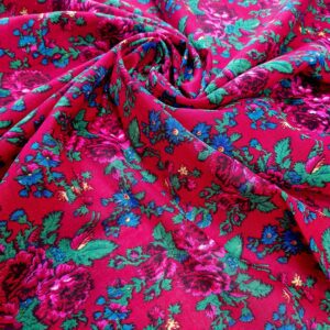 Țesătură pentru port popular roșie cu floricele albastre